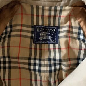 Burberry’s Original purchased in UK. New, old, never worn. size women’s small